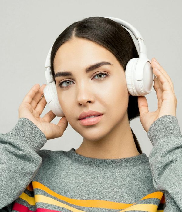 A serene woman looking into the distance with clarity and calm focus.